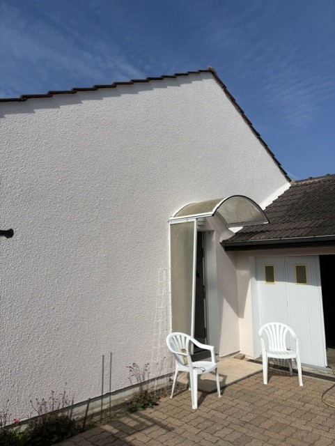 Façade après ravalement à Saint-Clément - L'Eco-Renov